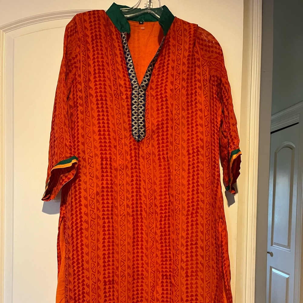 Vibrant Orange Tunic with Patterned Trim